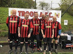 60s Troon Trojans  :  Clive (GK).  Dave Sh. (C).  Geoff. Richard.  James (VC).  Christine. Nigel.  John H.  Pete Holl.